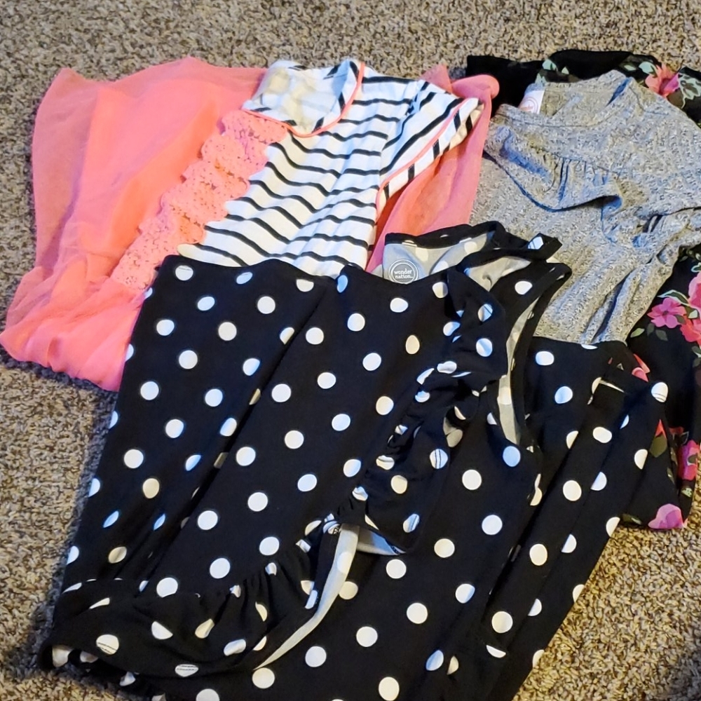 Three girl's dresses.